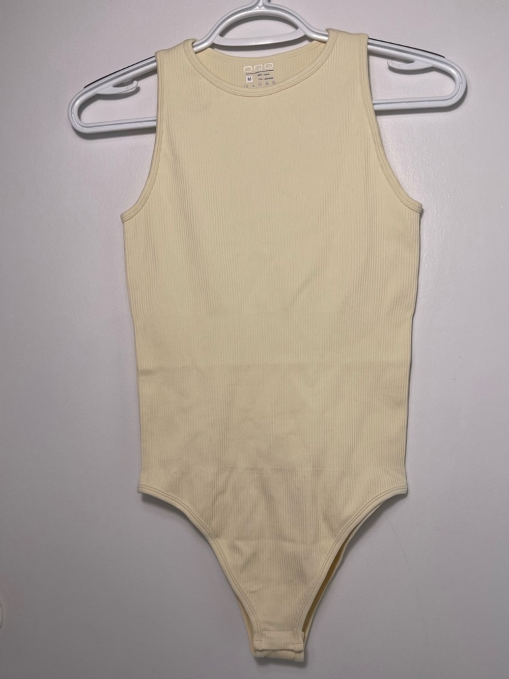OQQ Women’s Sleeveless Cream Ribbed Bodysuit - Minimal Crew Neck Size M NWOT